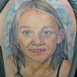 tattoo of a little girl