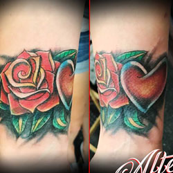 Tattoo of rose and heart